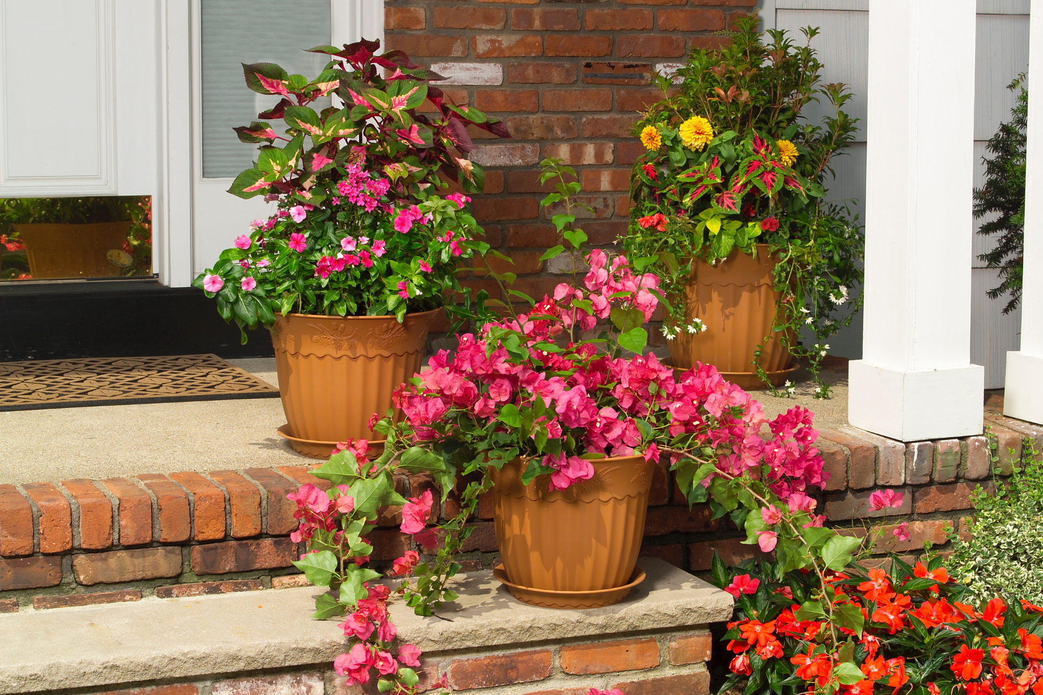 3. Upgrade your entryway planters