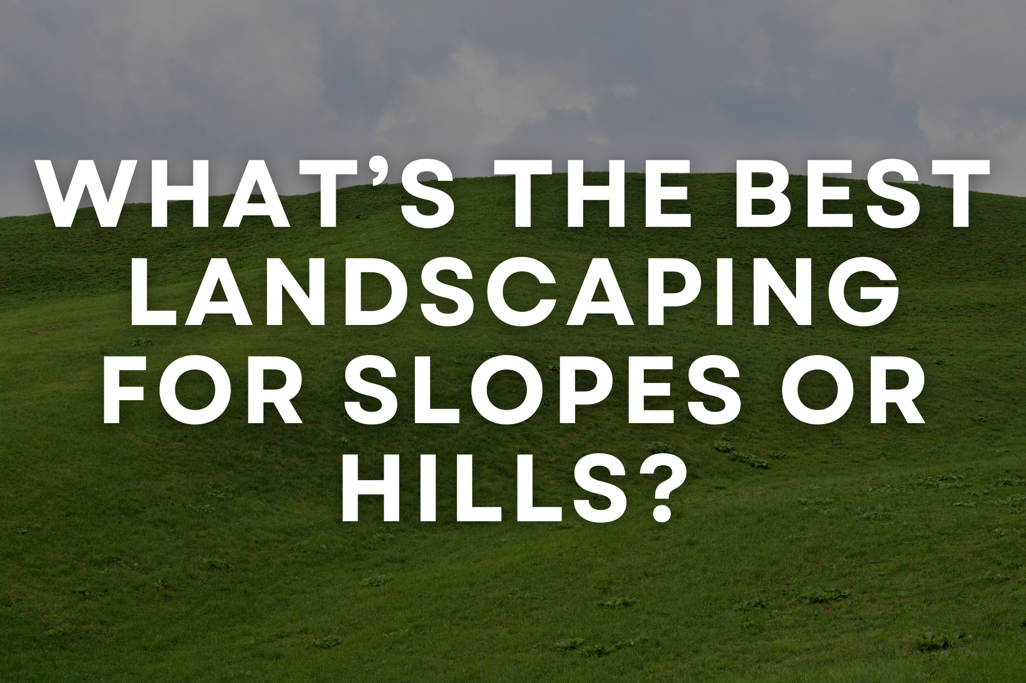 Terraced hillside with retaining walls and deep-rooted groundcovers for erosion control