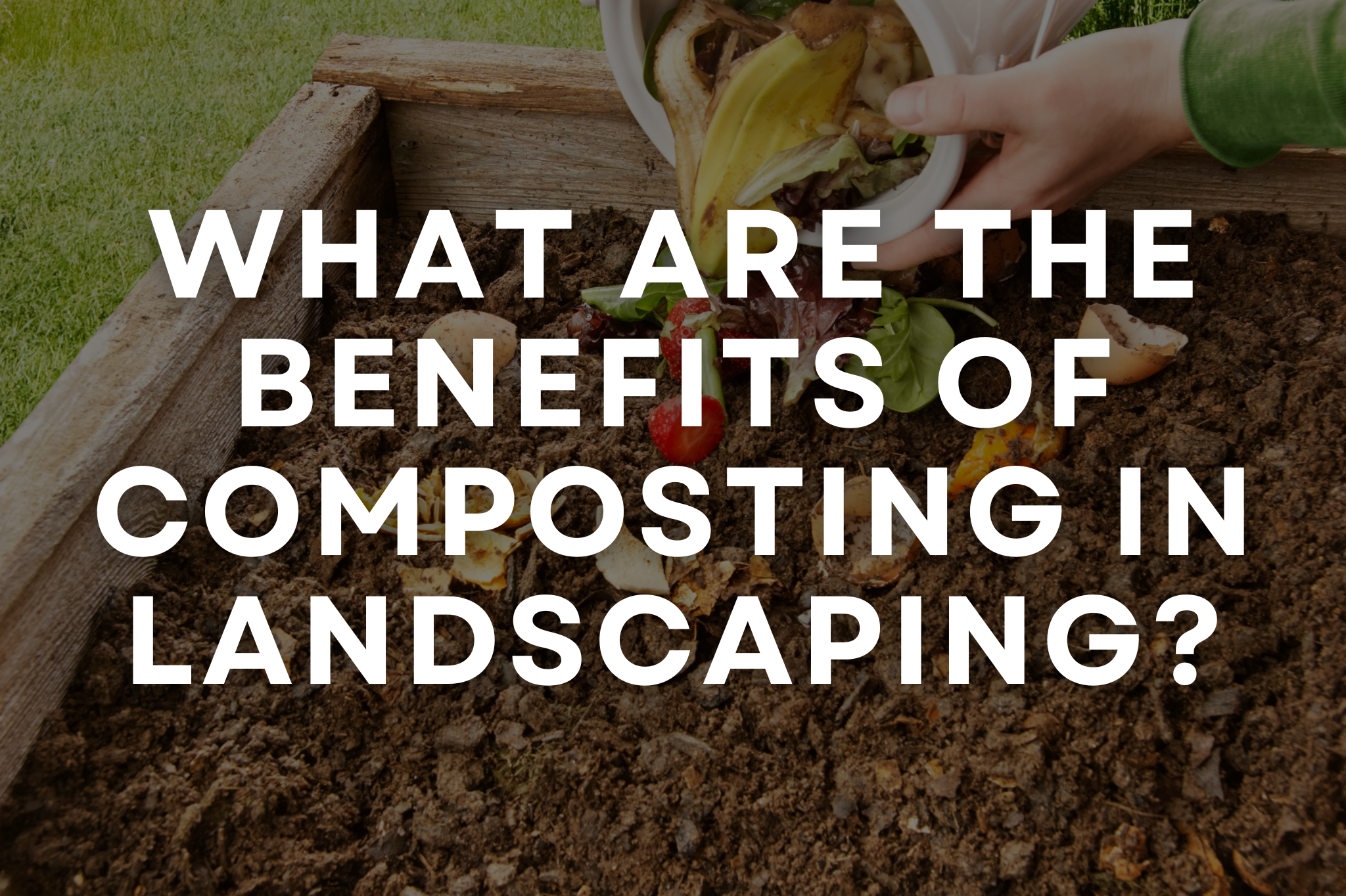 Rich compost being worked into garden soil for healthier planting beds