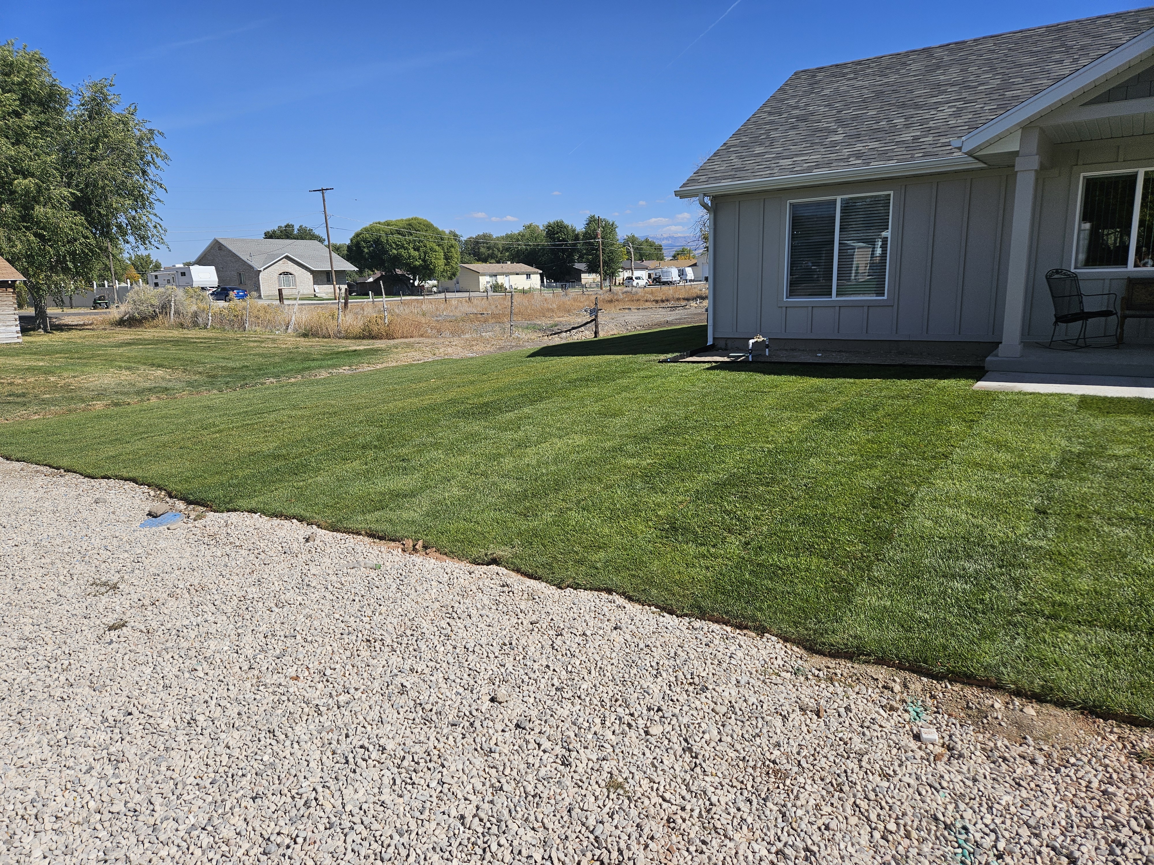 Beautiful landscaped yard transformation by C&K Landscaping