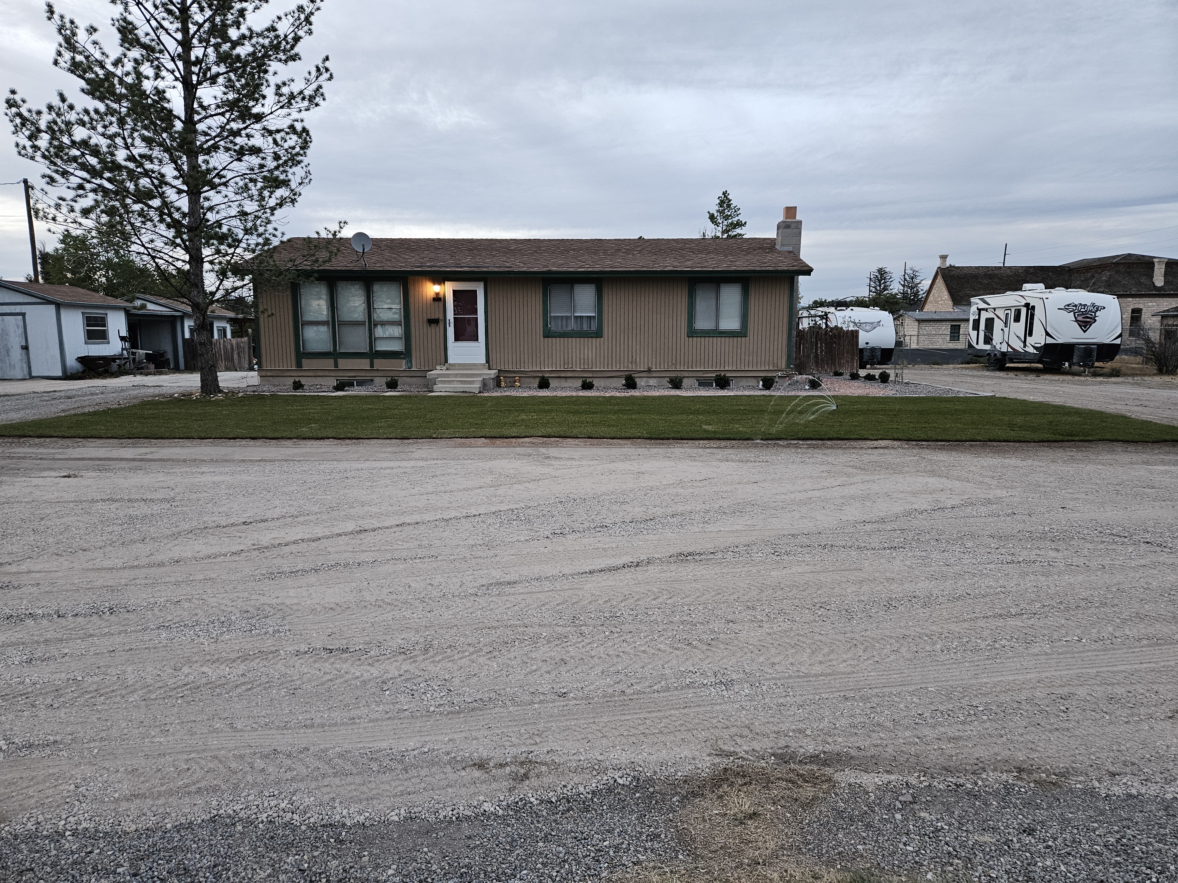 Poured concrete retaining wall stabilizing a grade change on a residential property