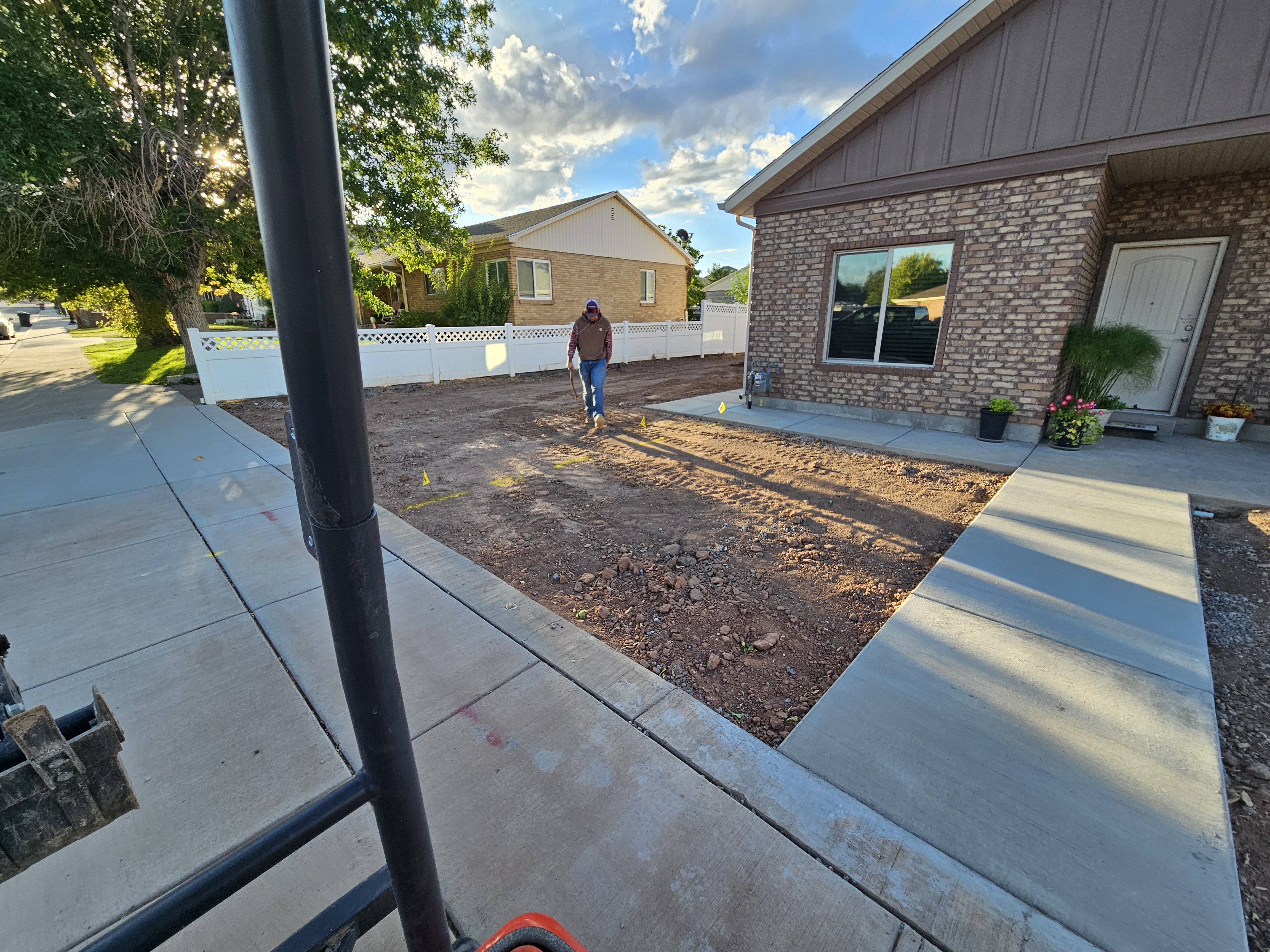 Xeriscape front yard landscape with native plants and decorative gravel for low water use